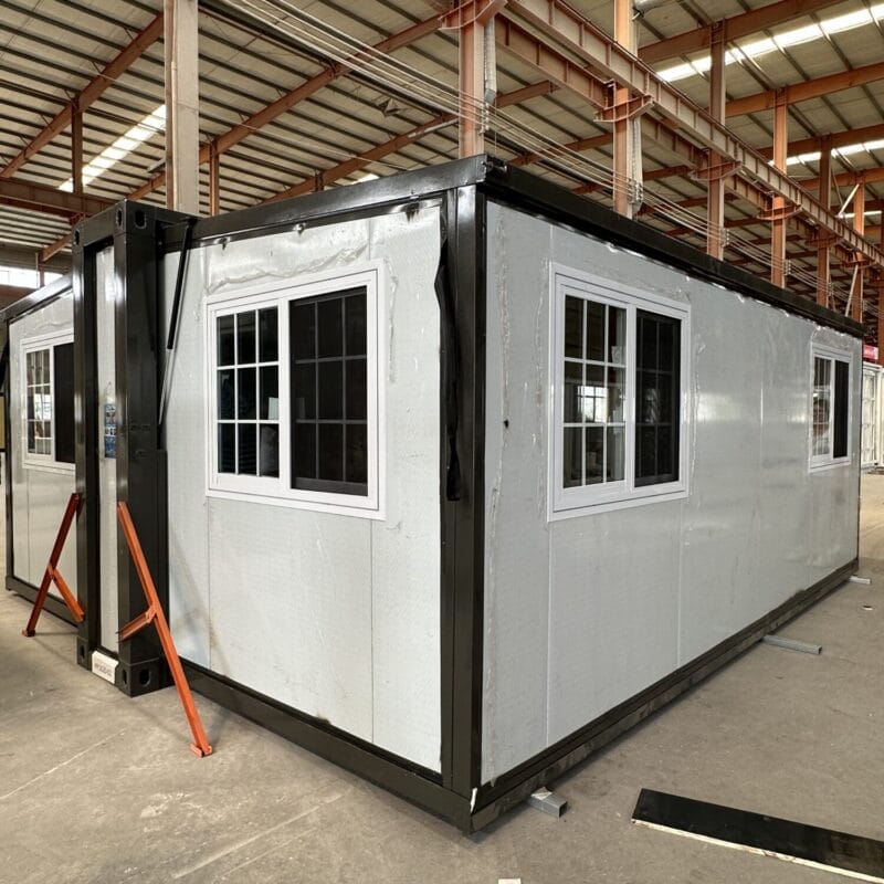 Black-framed 700mm mobile expandable house with hydraulic roof system and grid windows